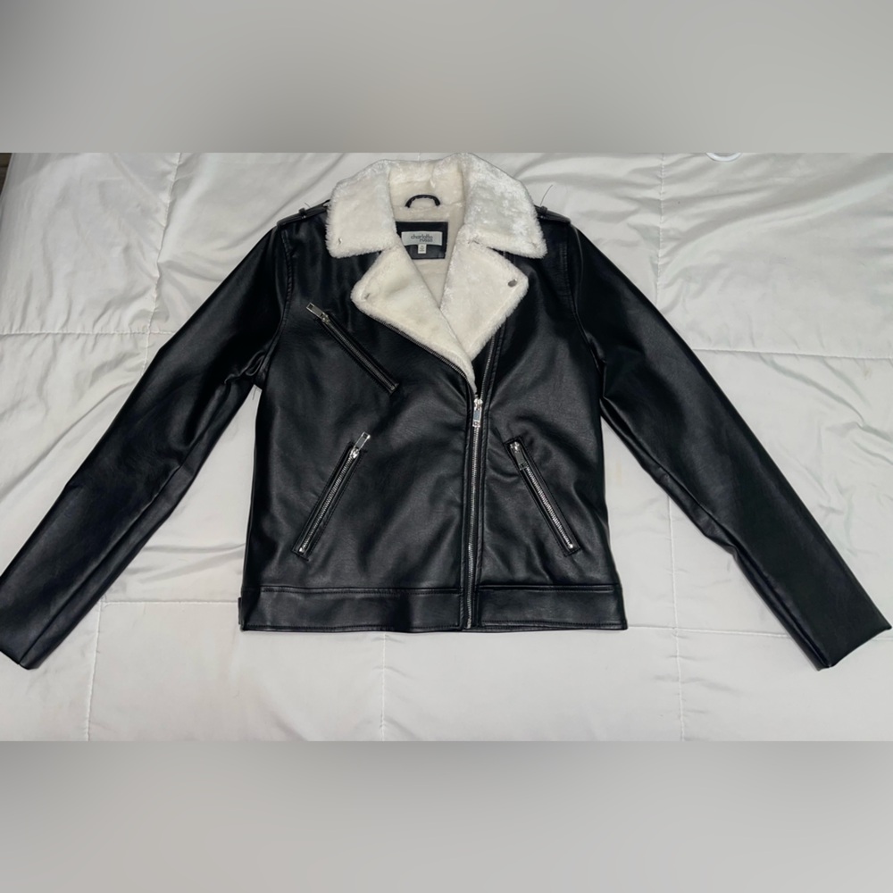 Fuzzy inside faux leather outside